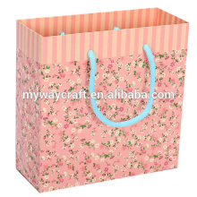 Kundenspezifische Pastellgrün und rosa Blumengeschenkpapierbeutel